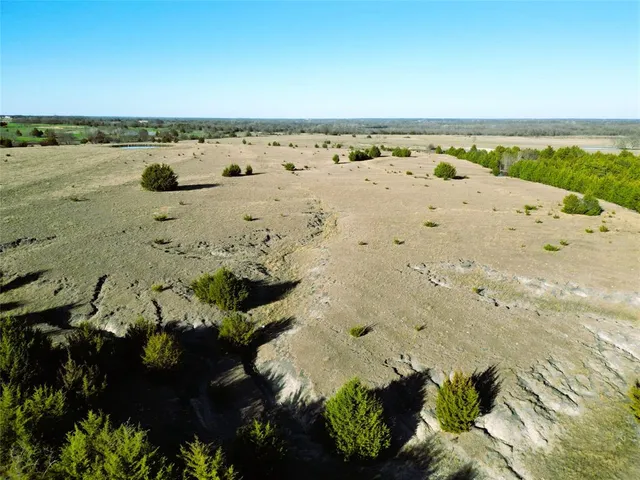 a view of lake with green space
