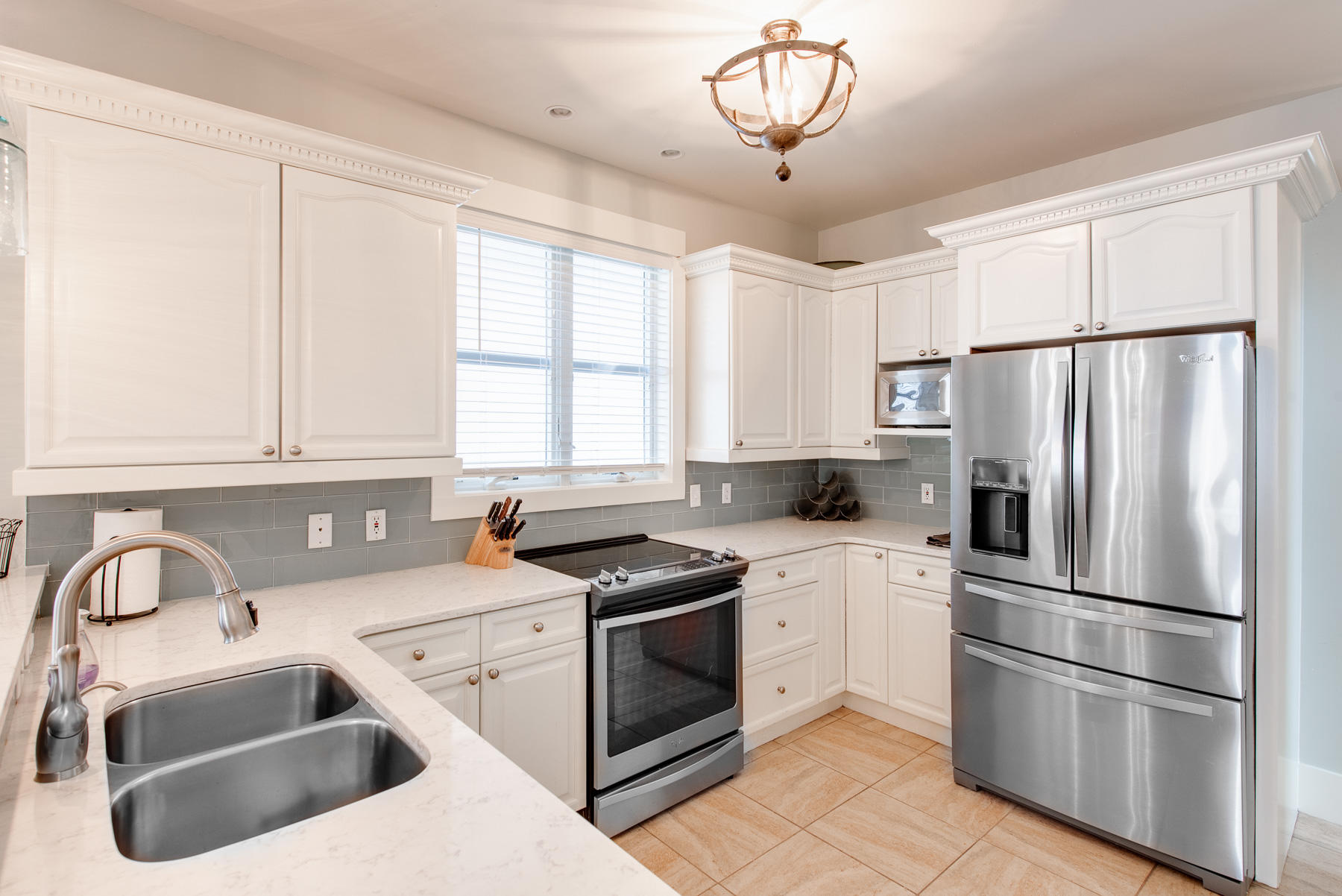 3 West Trigger Trail Inlet Beach Inlet Beach, FL 32461 - Photo 11 of 44 a kitchen with stainless steel appliances a refrigerator sink and cabinets