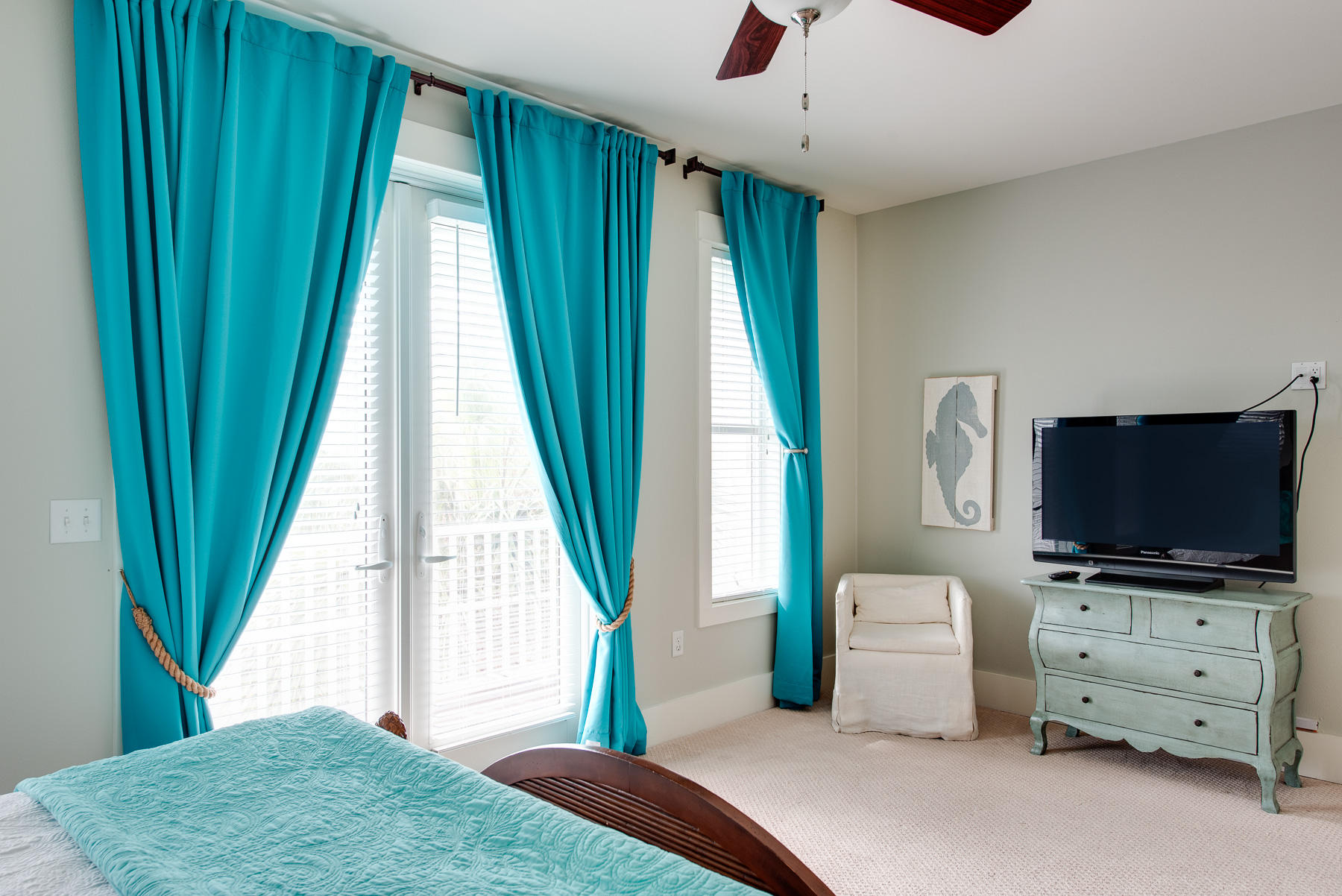 3 West Trigger Trail Inlet Beach Inlet Beach, FL 32461 - Photo 21 of 44 a bedroom with a bed and a flat screen tv