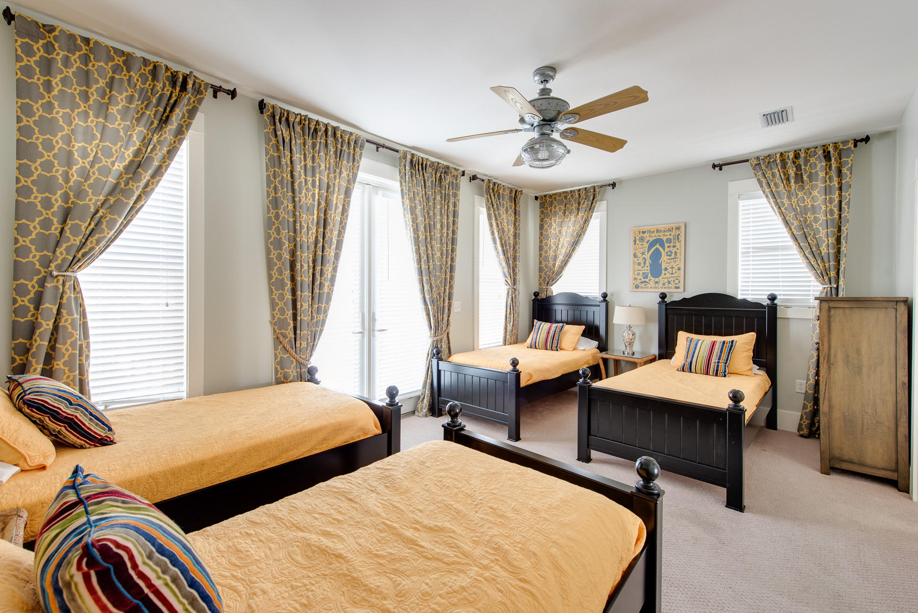 3 West Trigger Trail Inlet Beach Inlet Beach, FL 32461 - Photo 24 of 44 a bedroom with two beds and a chandelier