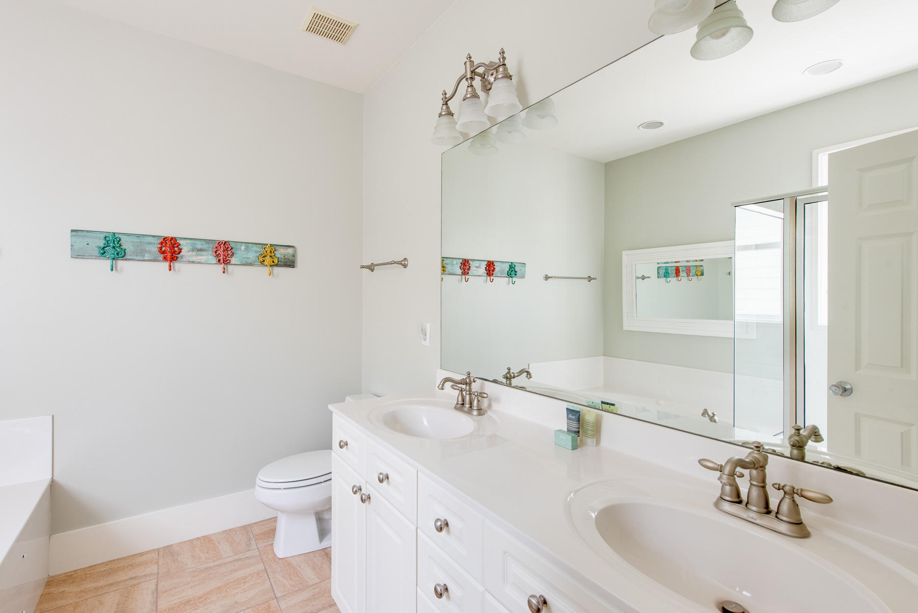 3 West Trigger Trail Inlet Beach Inlet Beach, FL 32461 - Photo 27 of 44 a bathroom with a sink a toilet and a mirror