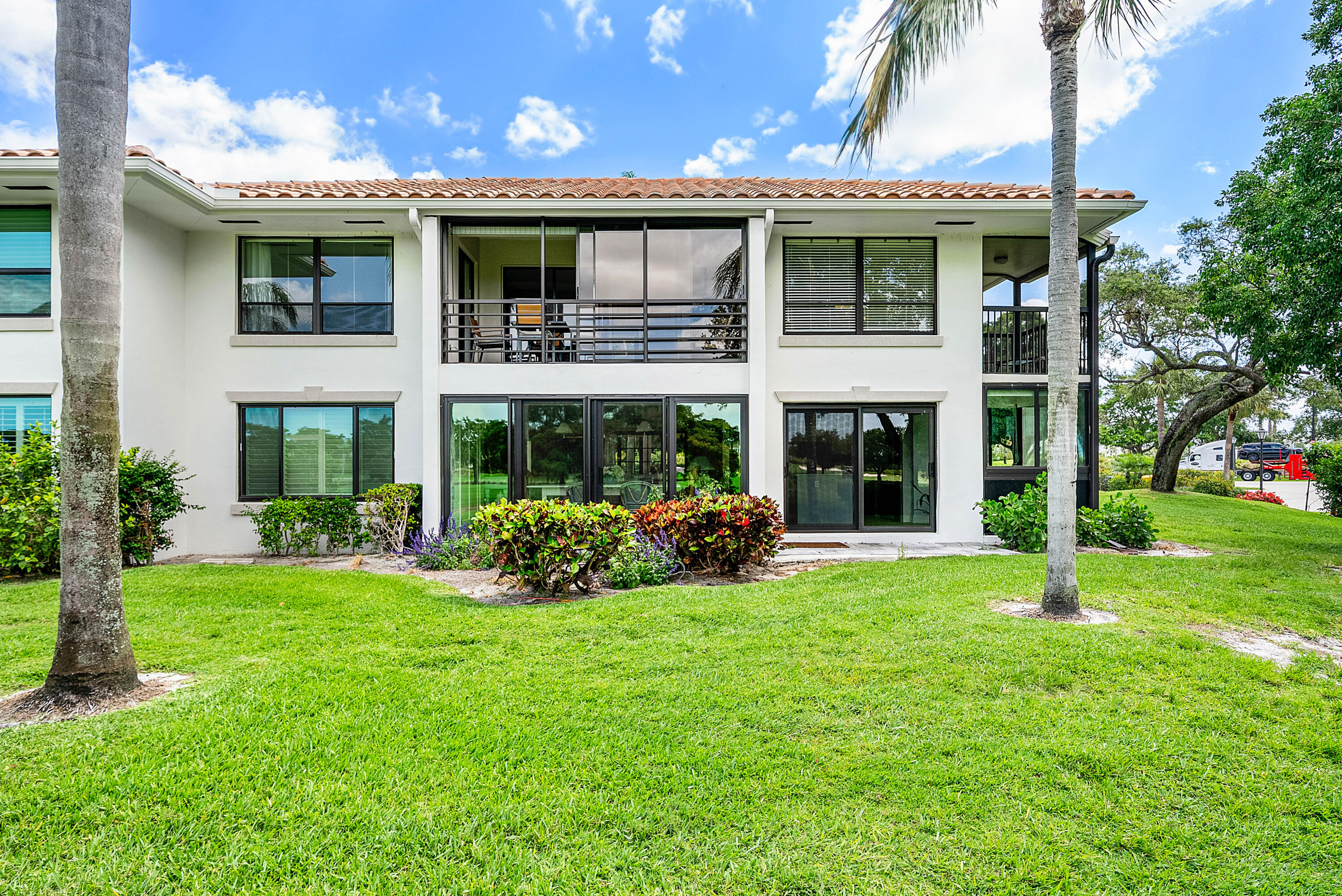 10111 Quail Covey Road, Unit HIBISCUS N Boynton Beach, FL 33436 - Photo 32 of 50 Back of building