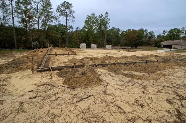 a view of swimming pool with a yard