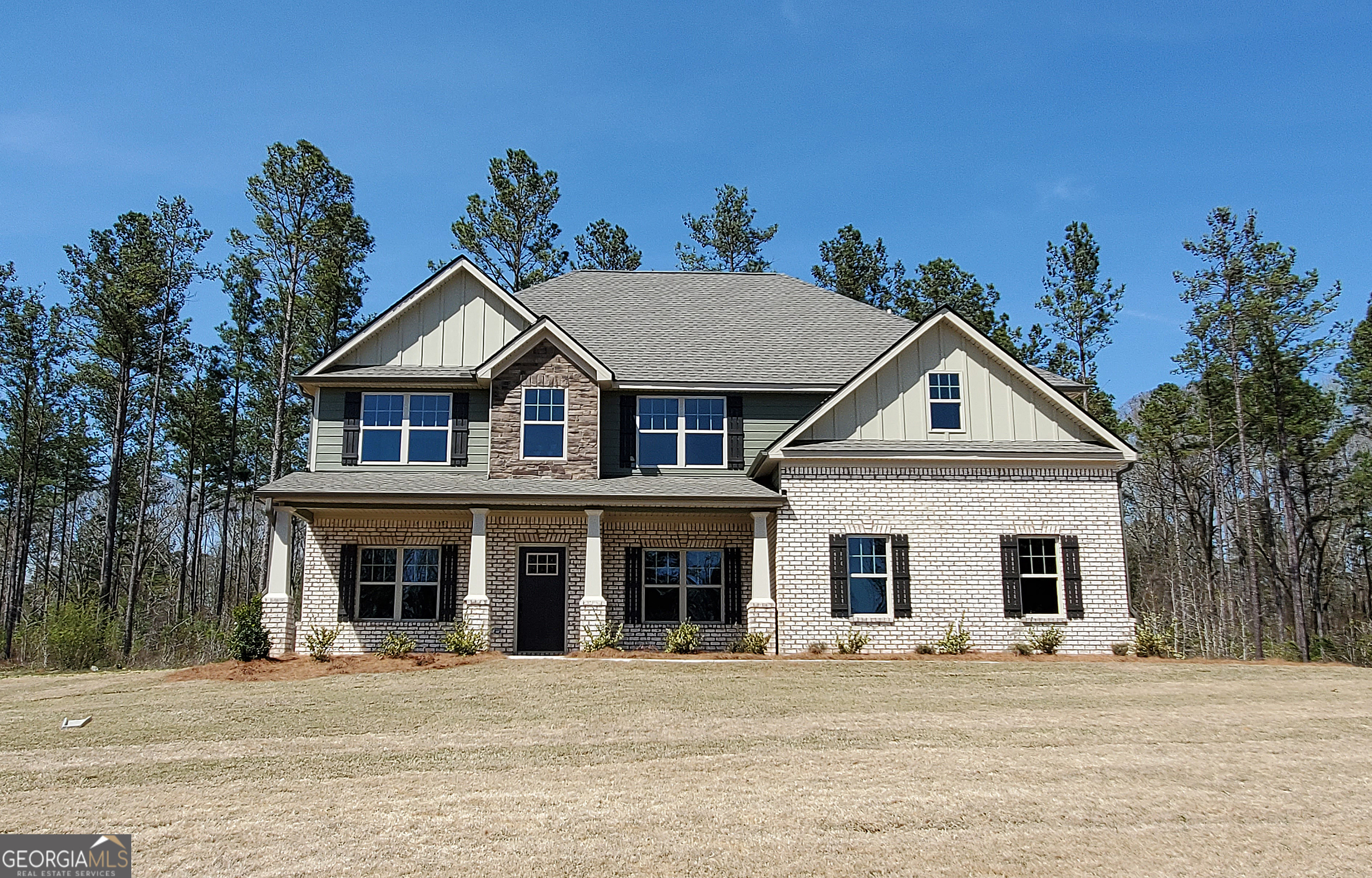 29 Homestead Circle Forsyth, GA 31029 - Photo 1 of 1 a front view of a house with a yard