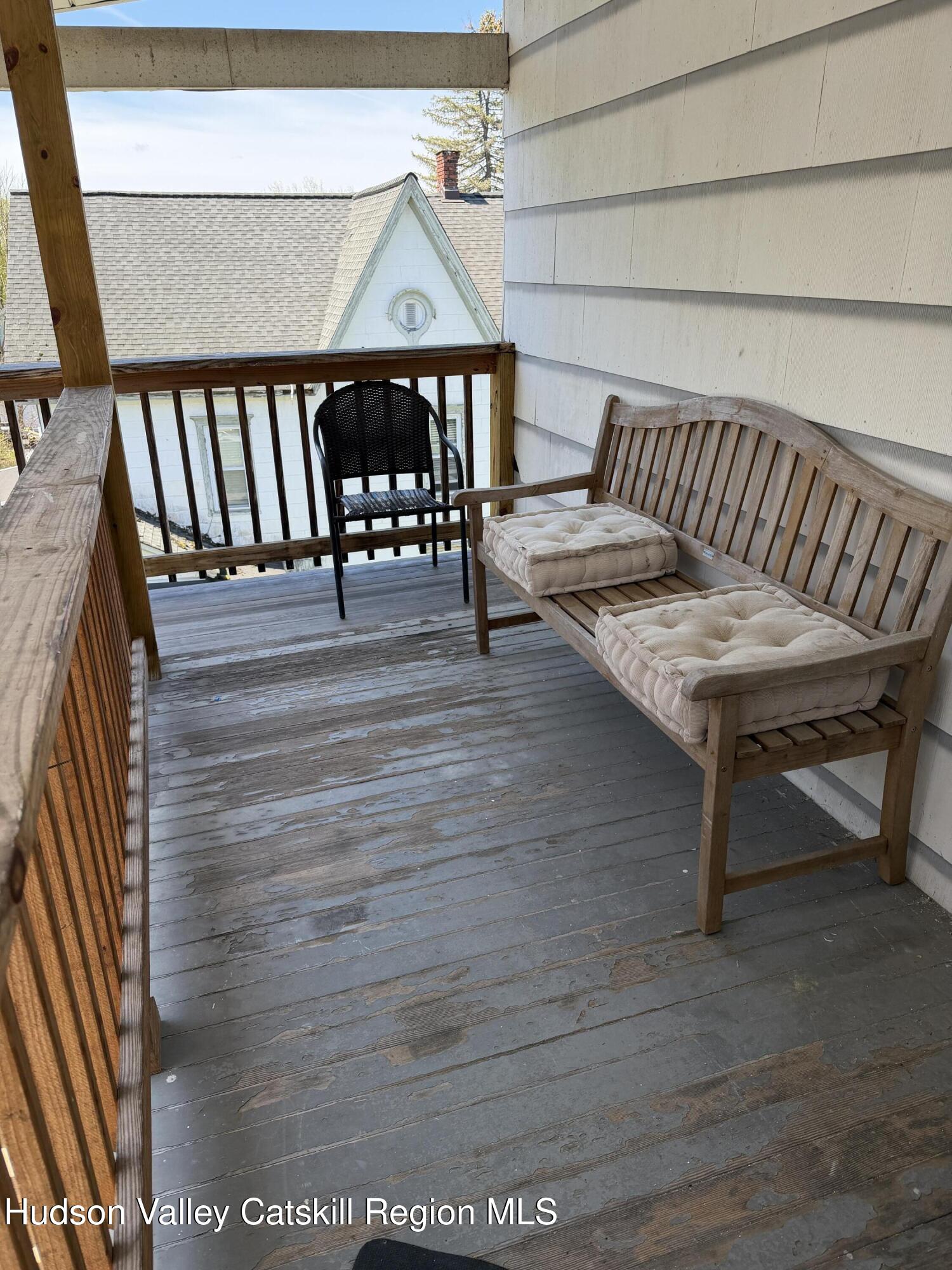 129 Main Street, Unit 3 Philmont, NY 12529 - Photo 8 of 8 a view of staircase with furniture and rug