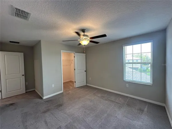 a view of hallway with livingroom