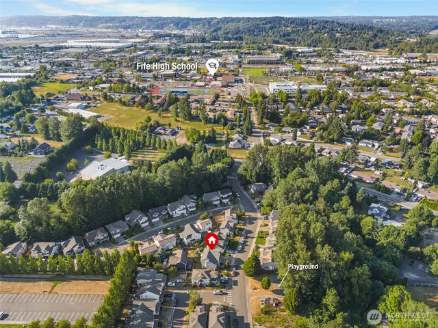 an aerial view of residential building and lake view