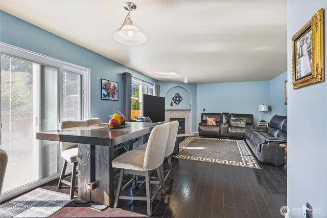 a workspace with furniture window and wooden floor