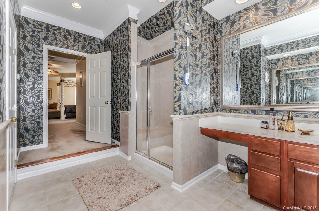 1982 Faison Avenue Fort Mill, SC 29708 - Photo 17 of 24 a spacious bathroom with a sink and a mirror