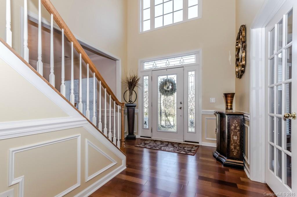 1982 Faison Avenue Fort Mill, SC 29708 - Photo 3 of 24 a view of an entryway with wooden floor and stairs