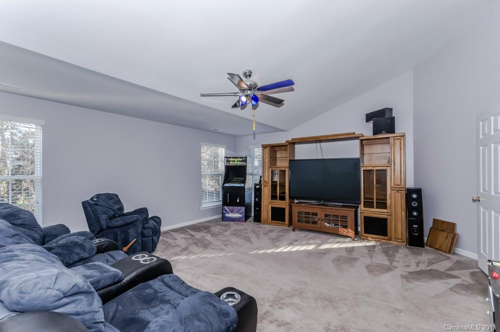 1982 Faison Avenue Fort Mill, SC 29708 - Photo 22 of 24 a living room with furniture and a flat screen tv
