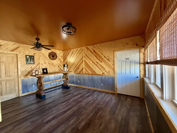 a view of entryway with wooden floor