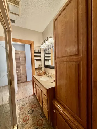 a kitchen with a refrigerator and a stove