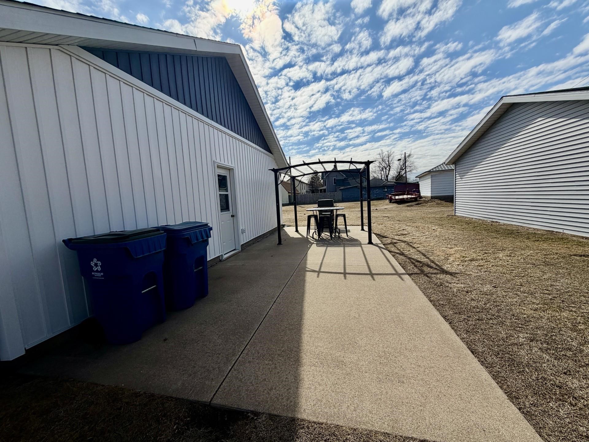 803 North Street Thomson, IL 61285 - Photo 26 of 26 a view of a backyard with sitting area