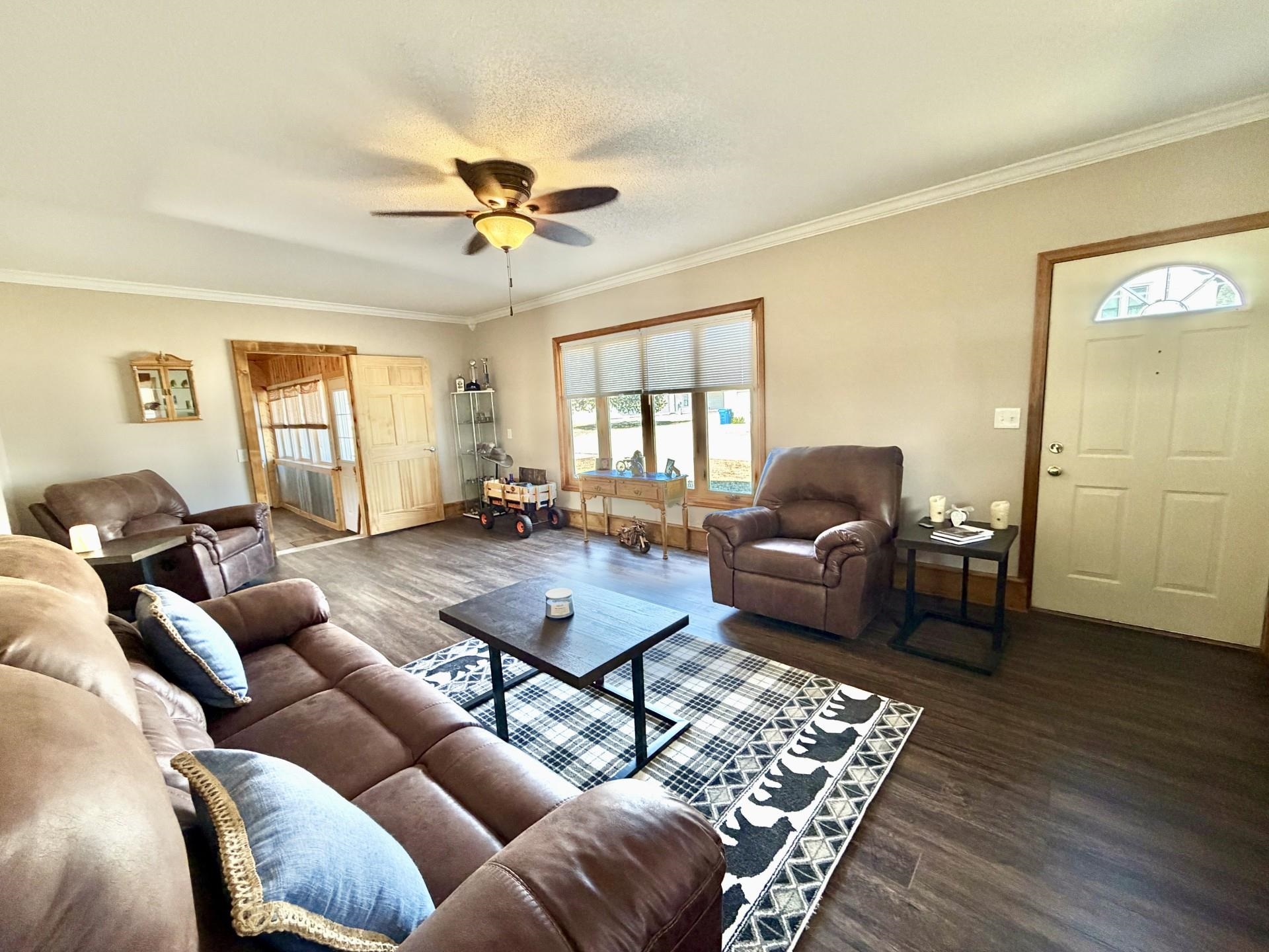 803 North Street Thomson, IL 61285 - Photo 3 of 26 a living room with furniture rug and window
