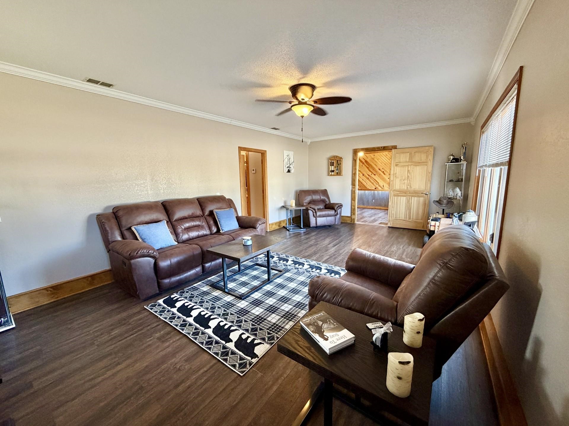 803 North Street Thomson, IL 61285 - Photo 5 of 26 a living room with furniture and a wooden floor