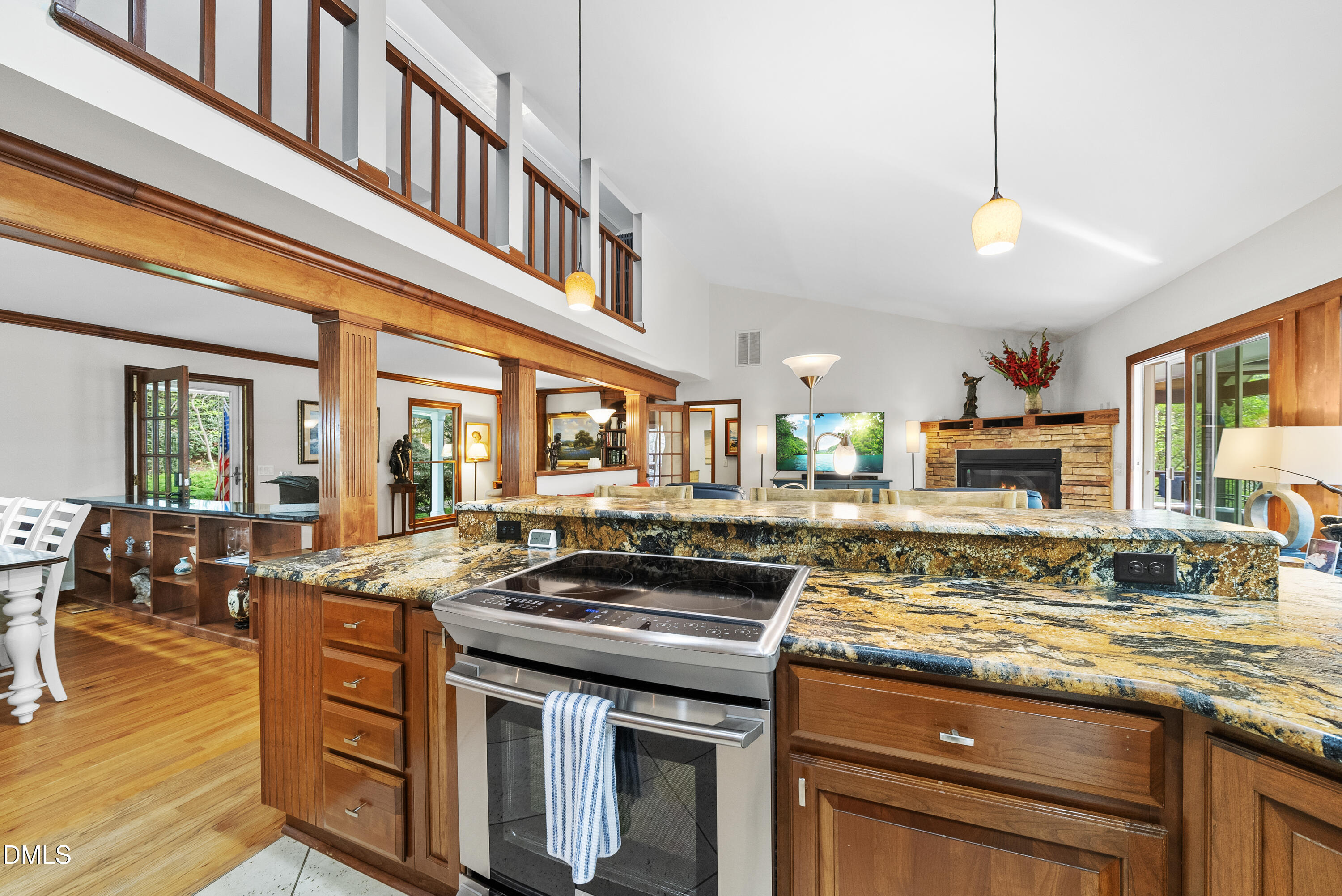 6200 Splitrock Trail Apex, NC 27539 - Photo 8 of 64 a kitchen with stainless steel appliances granite countertop a stove and a sink