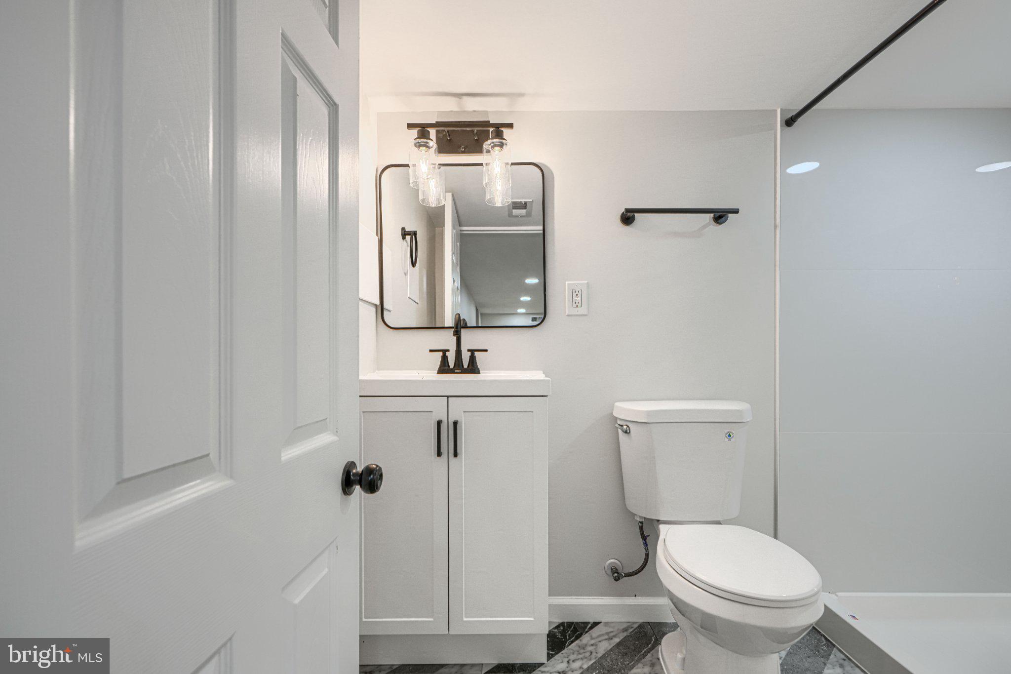 143 Rigdon Road Aberdeen, MD 21001 - Photo 44 of 57 Modern bathroom with sleek finishes.