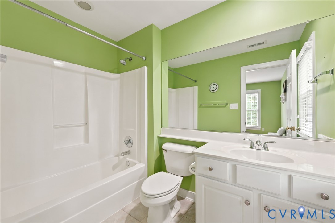 4701 Regal Oaks Road Glen Allen, VA 23059 - Photo 43 of 60 a bathroom with a sink toilet and shower