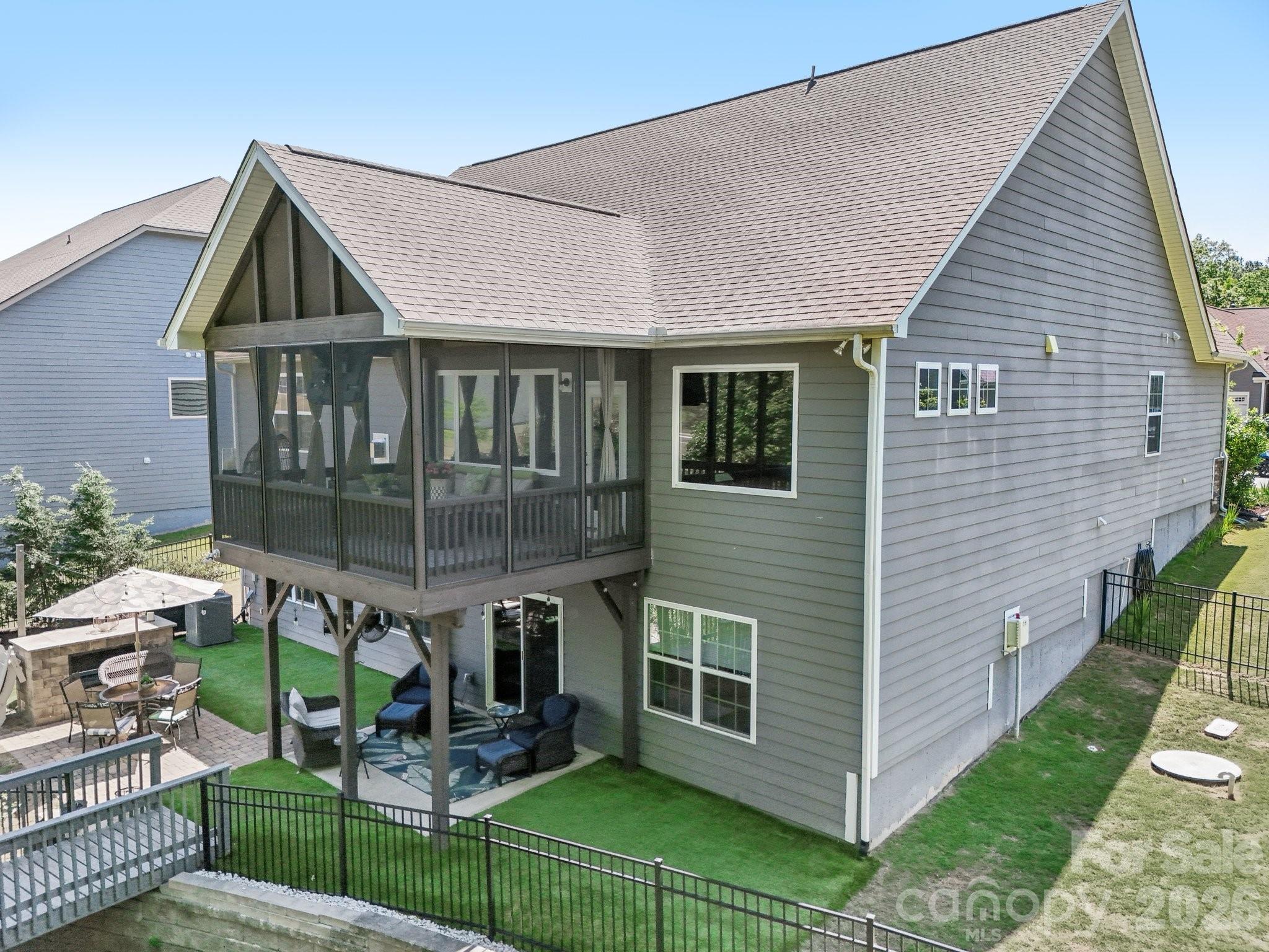 16427 Cozy Cove Road Charlotte, NC 28278 - Photo 38 of 47 a view of house with a yard and furniture