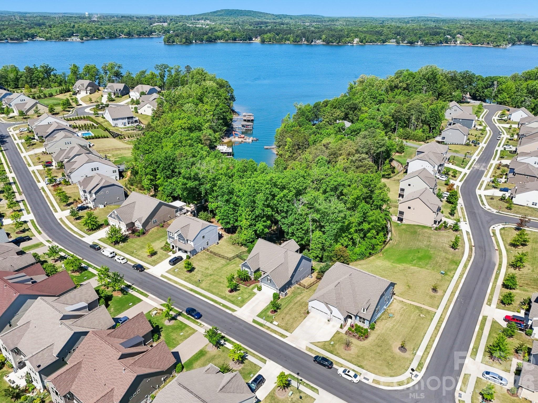16427 Cozy Cove Road Charlotte, NC 28278 - Photo 39 of 47 an aerial view of a city with lake view