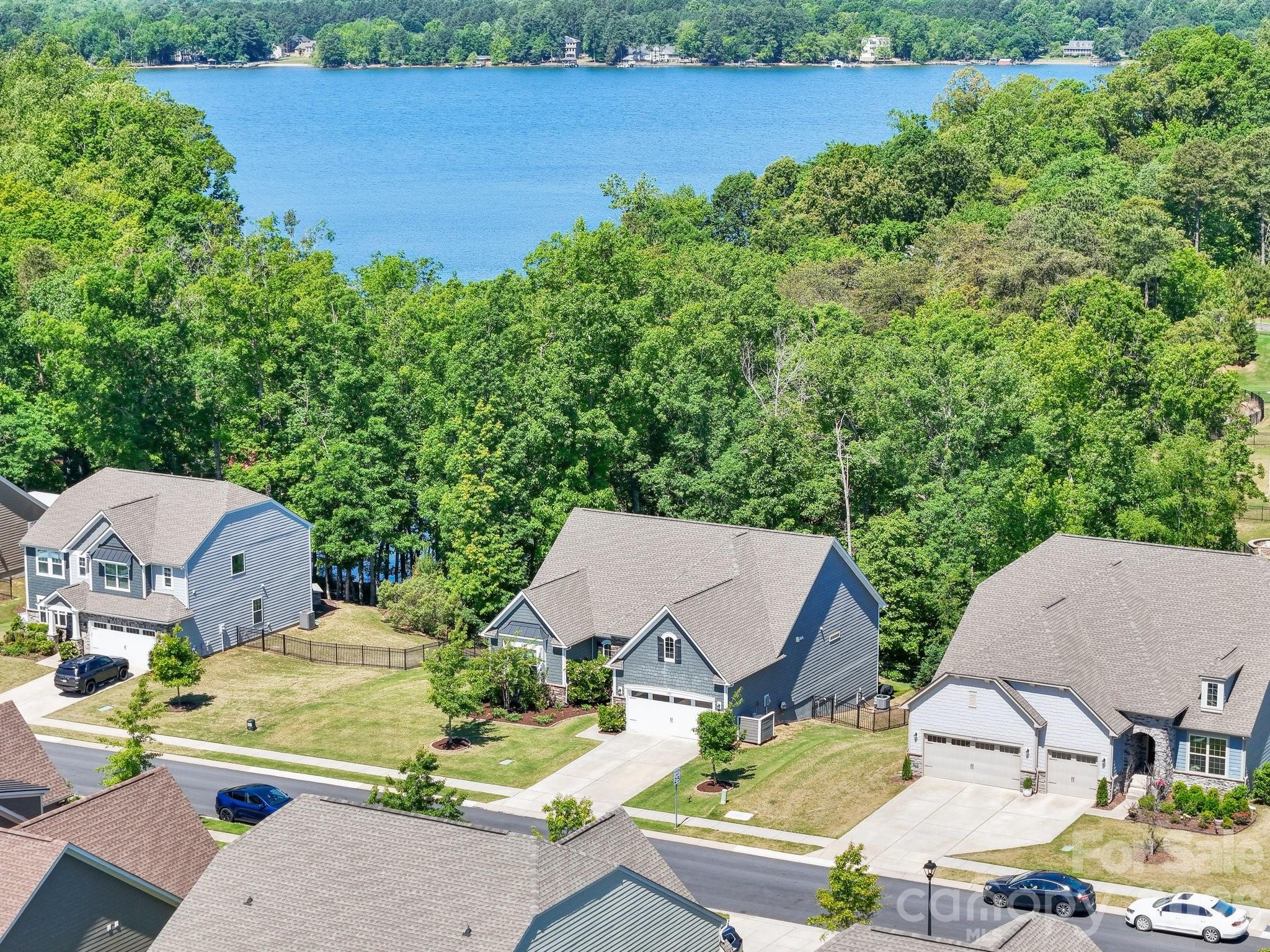 16427 Cozy Cove Road Charlotte, NC 28278 - Photo 40 of 47 an aerial view of a house with outdoor space and lake view