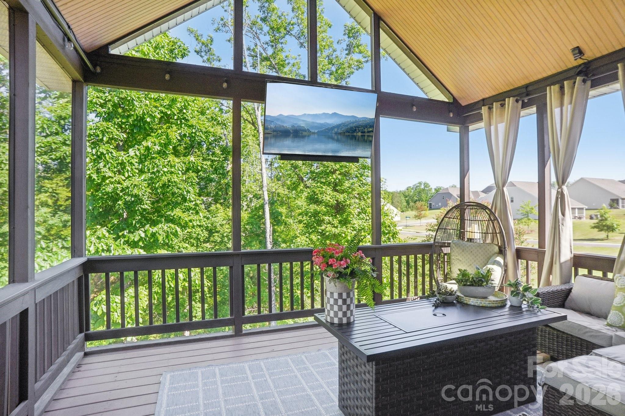 16427 Cozy Cove Road Charlotte, NC 28278 - Photo 4 of 47 a view of a chairs and table in the balcony