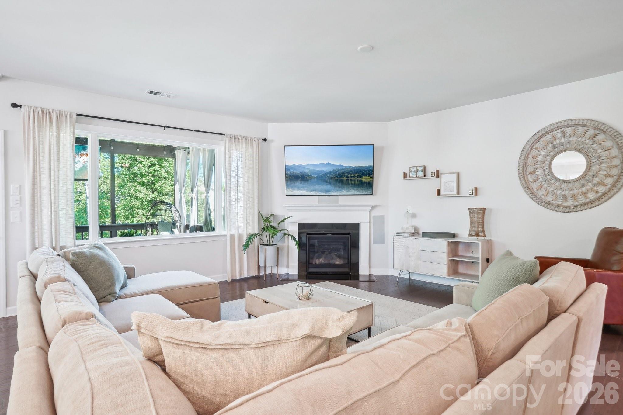 16427 Cozy Cove Road Charlotte, NC 28278 - Photo 8 of 47 a living room with furniture fireplace and window