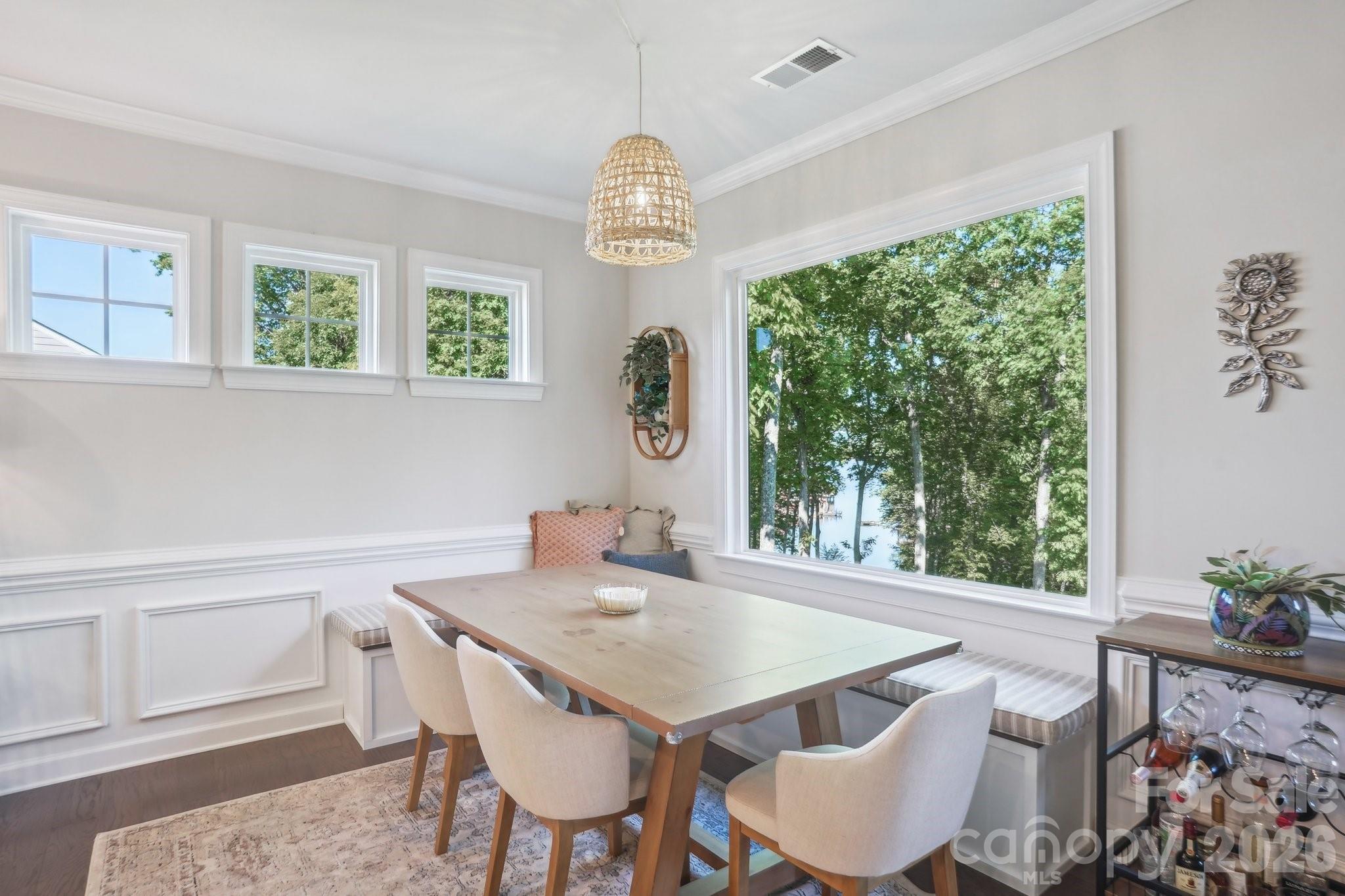 16427 Cozy Cove Road Charlotte, NC 28278 - Photo 9 of 47 a view of a dining room with furniture window and outside view
