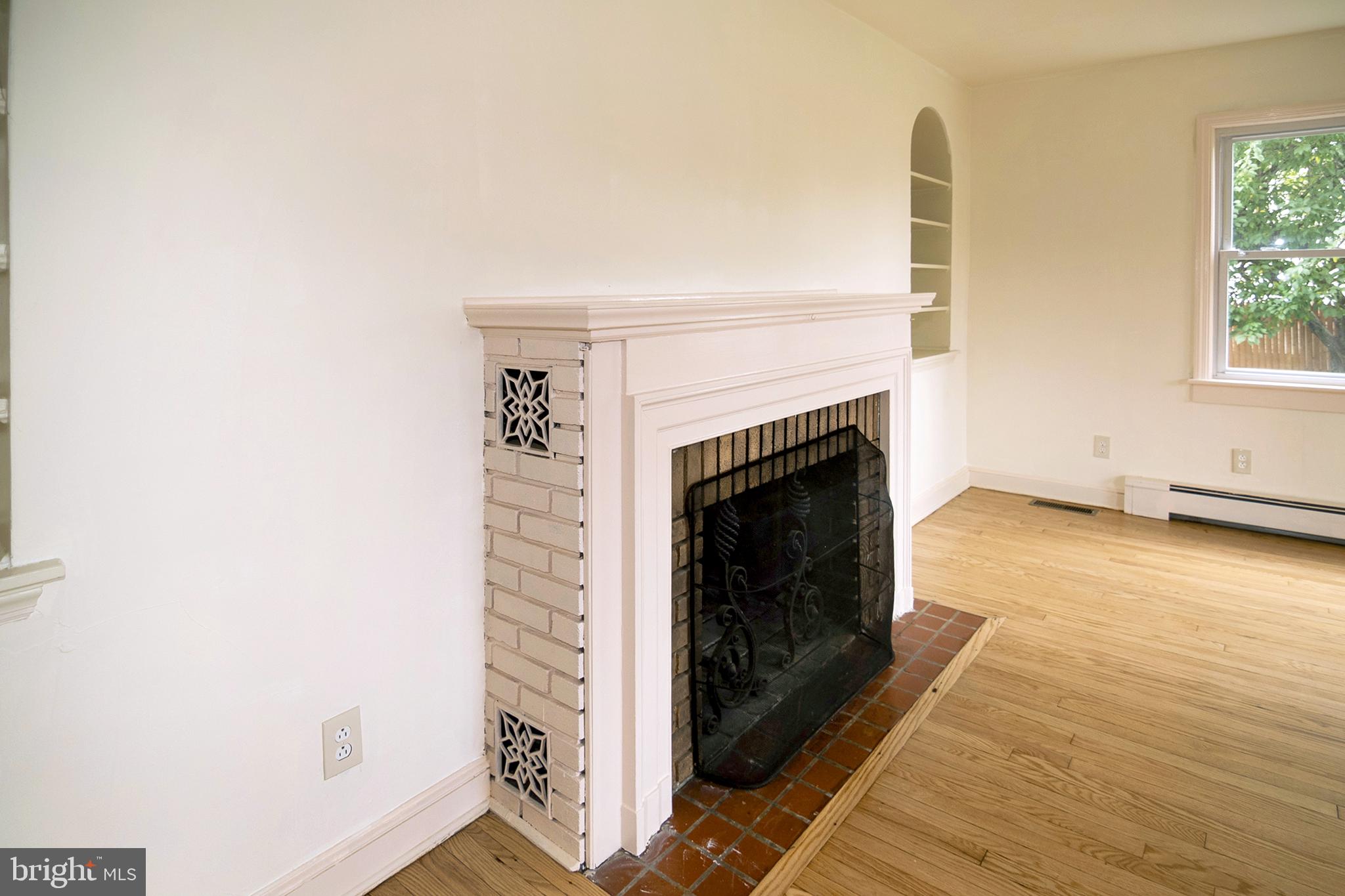 920 South Spring Road Vineland, NJ 08361 - Photo 11 of 50 Wood burning fireplace in living room