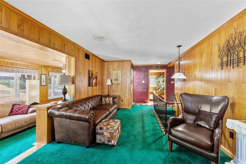 5920 Lee Street Export, PA 15632 - Photo 17 of 43 a living room with furniture and a large window