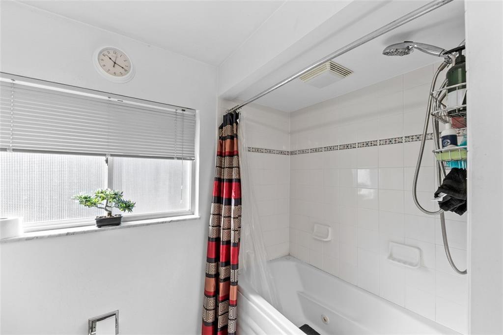 5920 Lee Street Export, PA 15632 - Photo 32 of 43 a bathroom with a shower and a sink