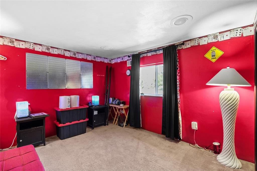 5920 Lee Street Export, PA 15632 - Photo 34 of 43 a bedroom with a bed and a mirror