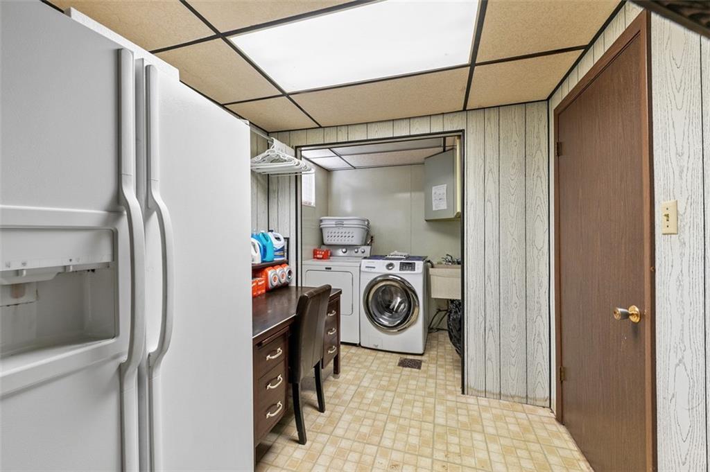 5920 Lee Street Export, PA 15632 - Photo 41 of 43 a utility room with dryer and washer