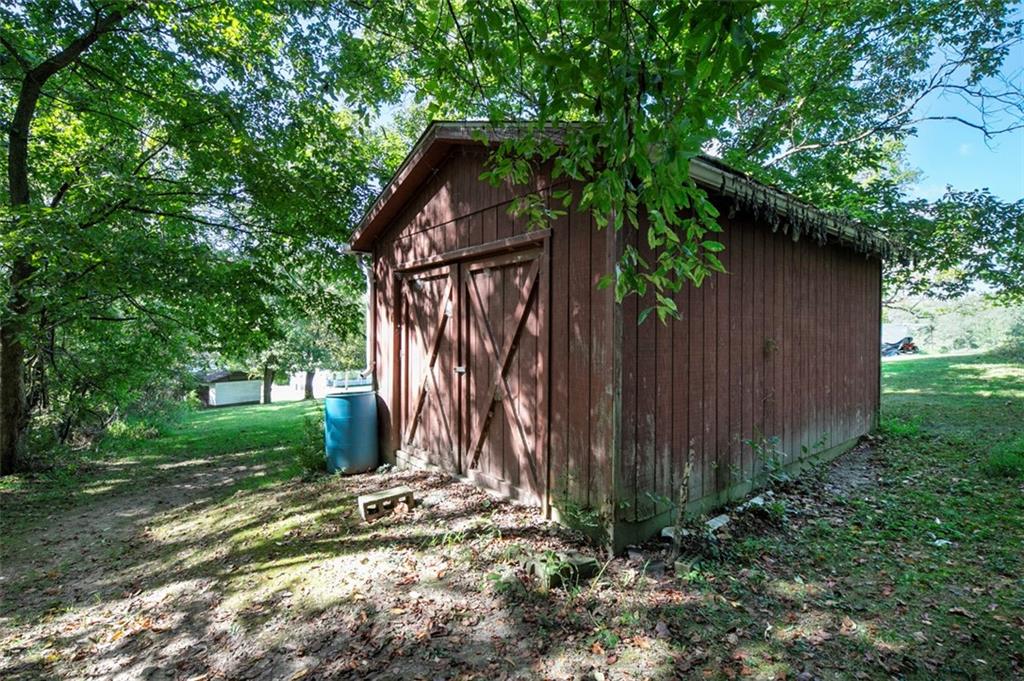 5920 Lee Street Export, PA 15632 - Photo 7 of 43 a backyard of a house with lots of green space