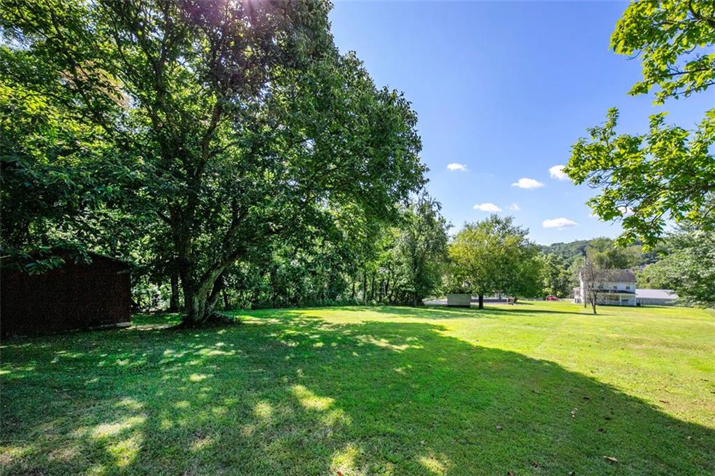 5920 Lee Street Export, PA 15632 - Photo 9 of 43 a view of a park with a tree in the background