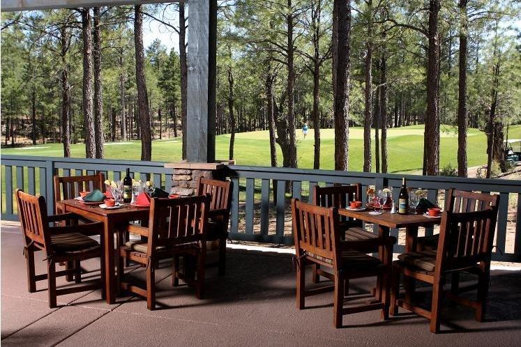380 West Falling Leaf Road, Unit 41 Show Low, AZ 85901 - Photo 9 of 11 patio dining at the Clubhouse