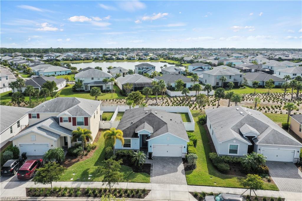 17549 Timberline Parkway Babcock Ranch, FL 33982 - Photo 1 of 39 an aerial view of residential houses with outdoor space