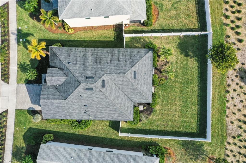 17549 Timberline Parkway Babcock Ranch, FL 33982 - Photo 26 of 39 an aerial view of a house with a yard