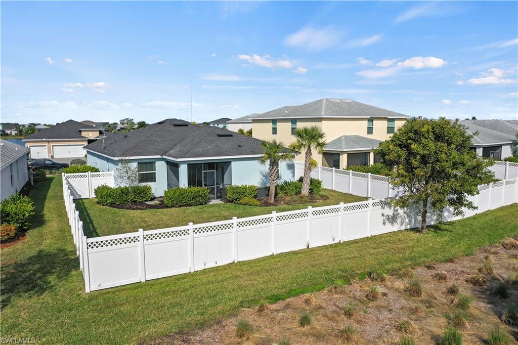17549 Timberline Parkway Babcock Ranch, FL 33982 - Photo 28 of 39 a front view of house with yard and green space