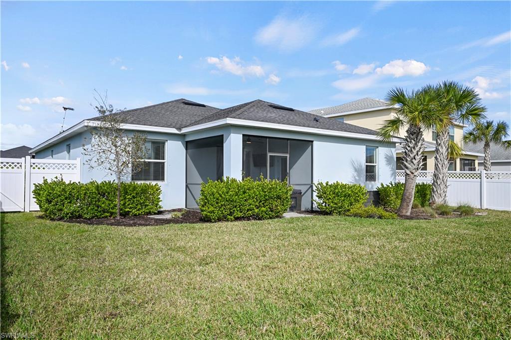17549 Timberline Parkway Babcock Ranch, FL 33982 - Photo 29 of 39 a front view of a house with a yard