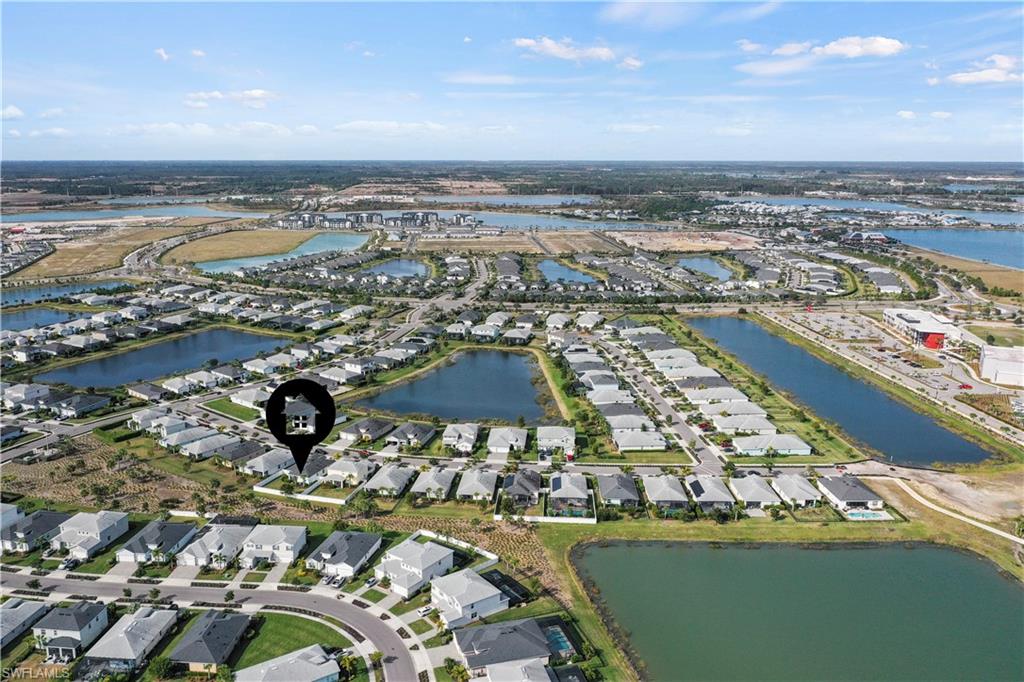 17549 Timberline Parkway Babcock Ranch, FL 33982 - Photo 33 of 39 an aerial view of residential houses with outdoor space