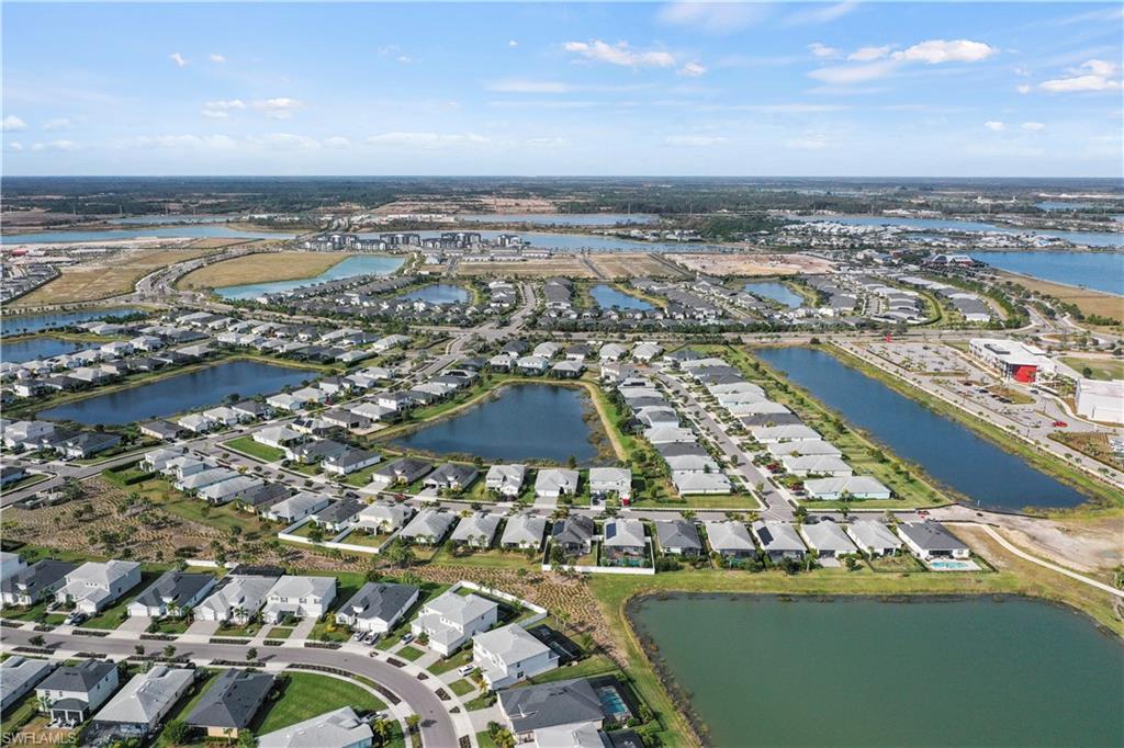 17549 Timberline Parkway Babcock Ranch, FL 33982 - Photo 34 of 39 an aerial view of residential houses with outdoor space