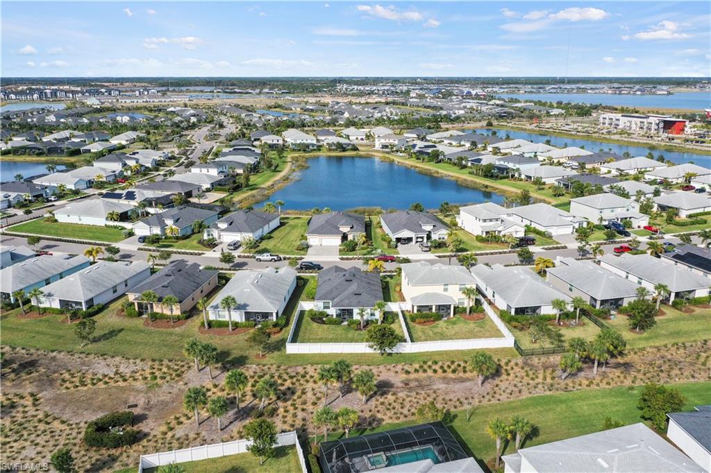 17549 Timberline Parkway Babcock Ranch, FL 33982 - Photo 37 of 39 an aerial view of residential houses with outdoor space