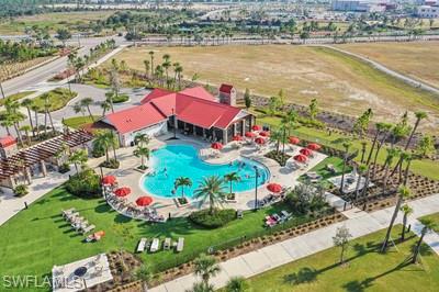 17549 Timberline Parkway Babcock Ranch, FL 33982 - Photo 38 of 39 an aerial view of residential houses with outdoor space and lake view