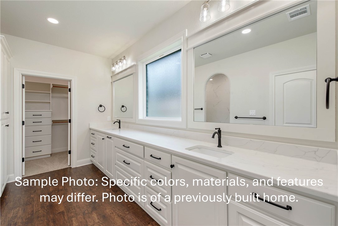 4027 Pacific Crest Way Bryan, TX 77802 - Photo 9 of 23 a bathroom with a sink and a mirror