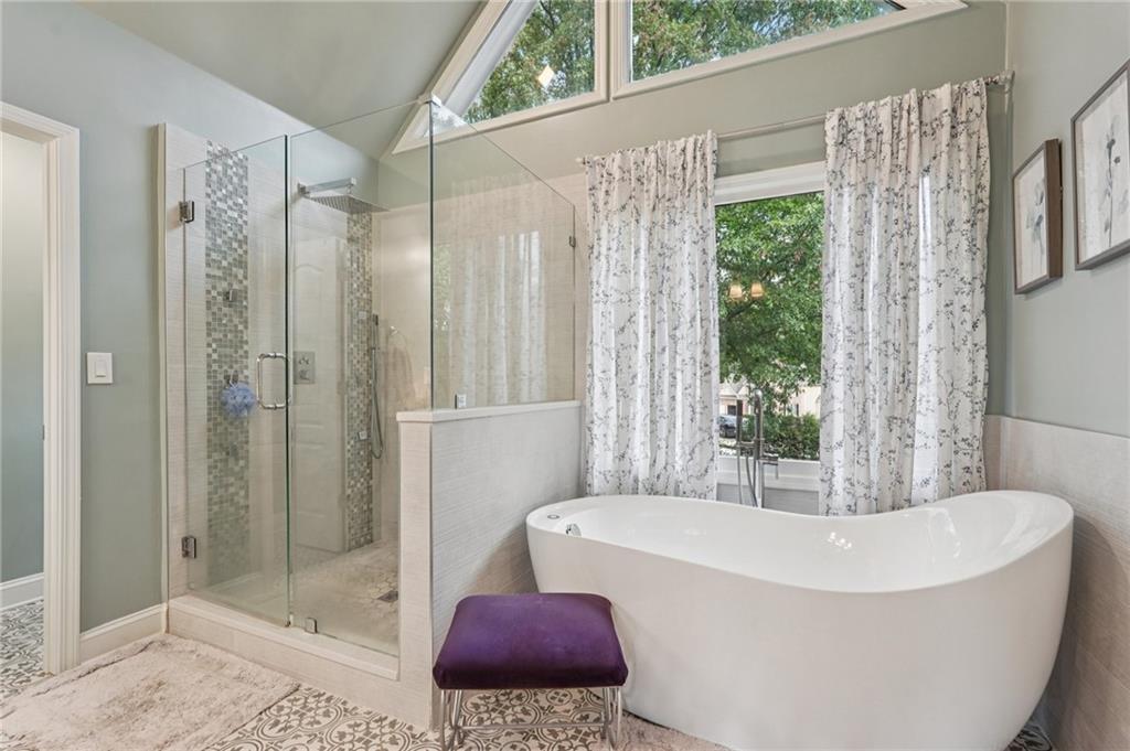 3820 Ridge Point Drive Suwanee, GA 30024 - Photo 28 of 41 a white bath tub sitting next to a shower