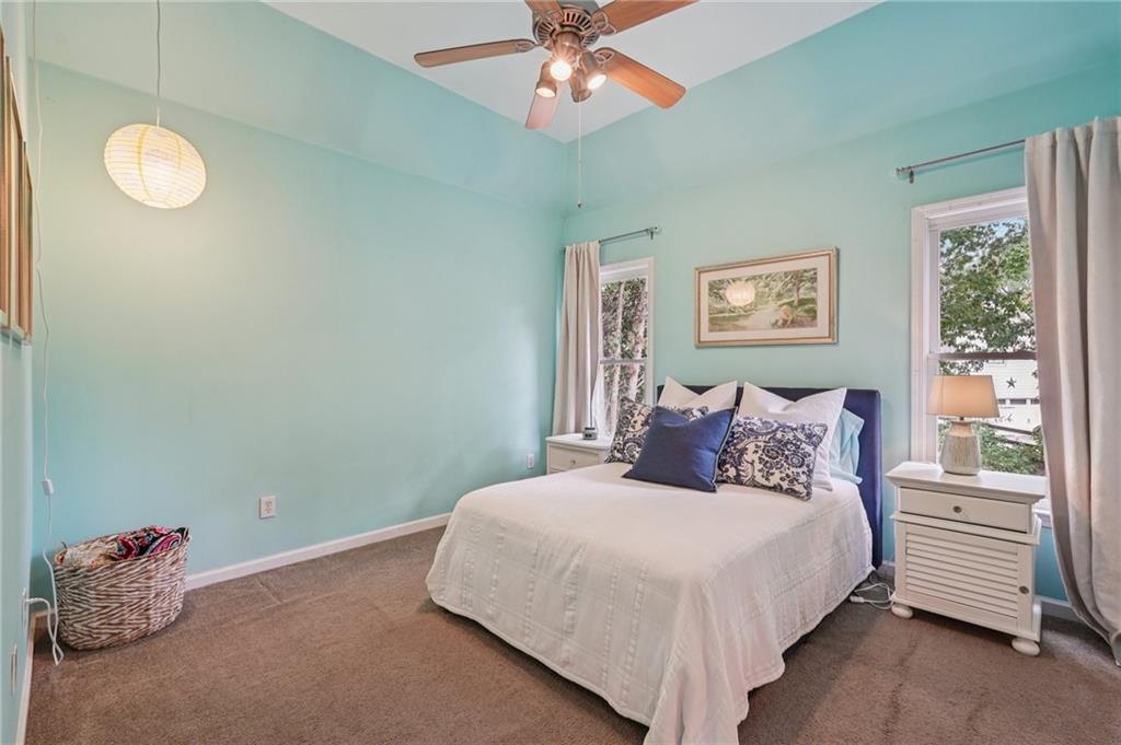 3820 Ridge Point Drive Suwanee, GA 30024 - Photo 35 of 41 a bedroom with a bed and a window