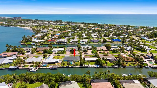 a view of a livingroom with wooden floor and window