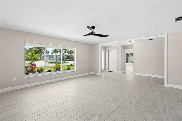 a view of an empty room with a bathroom